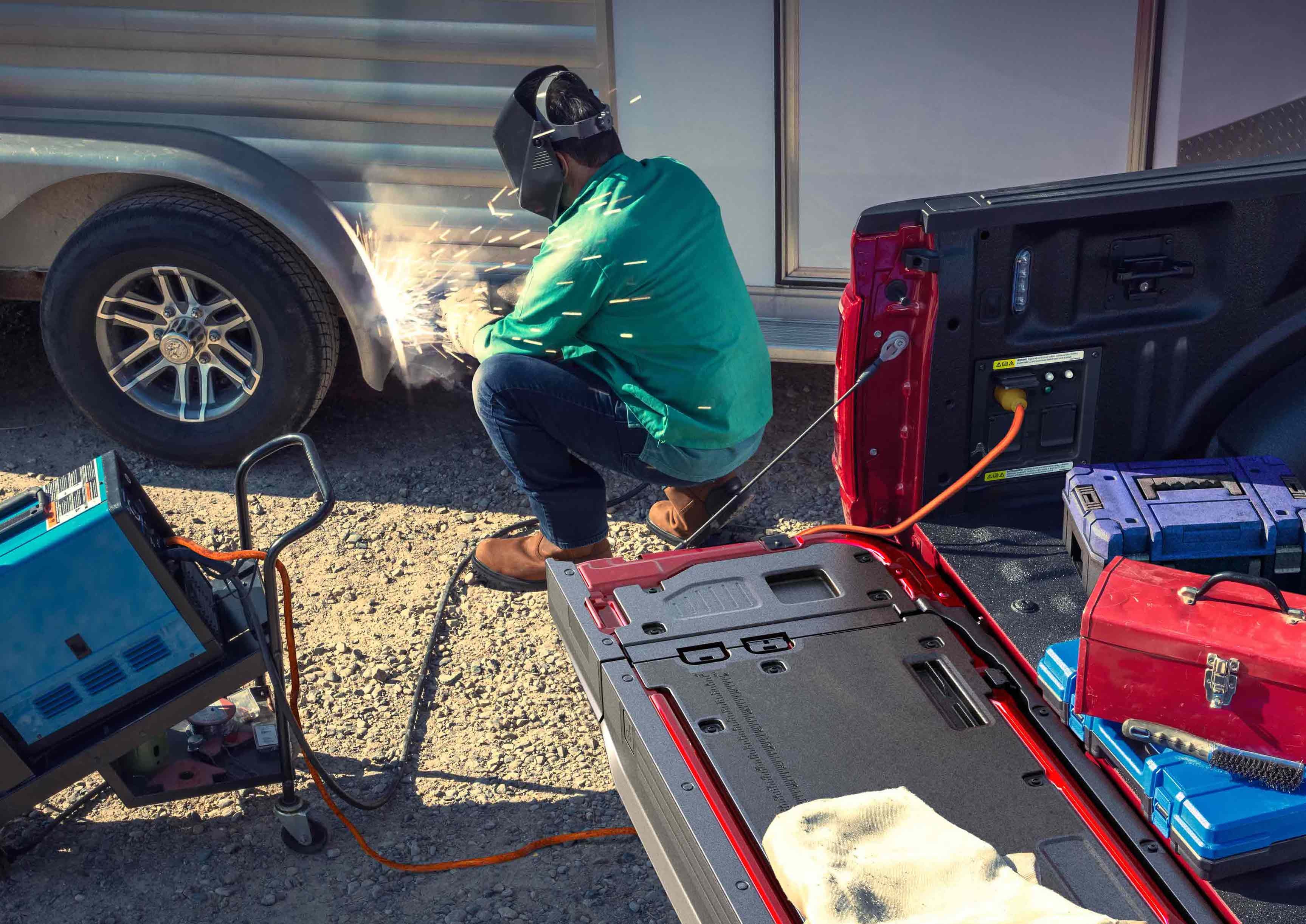 Ford F-150 using onboard power to operate equipment at a worksite