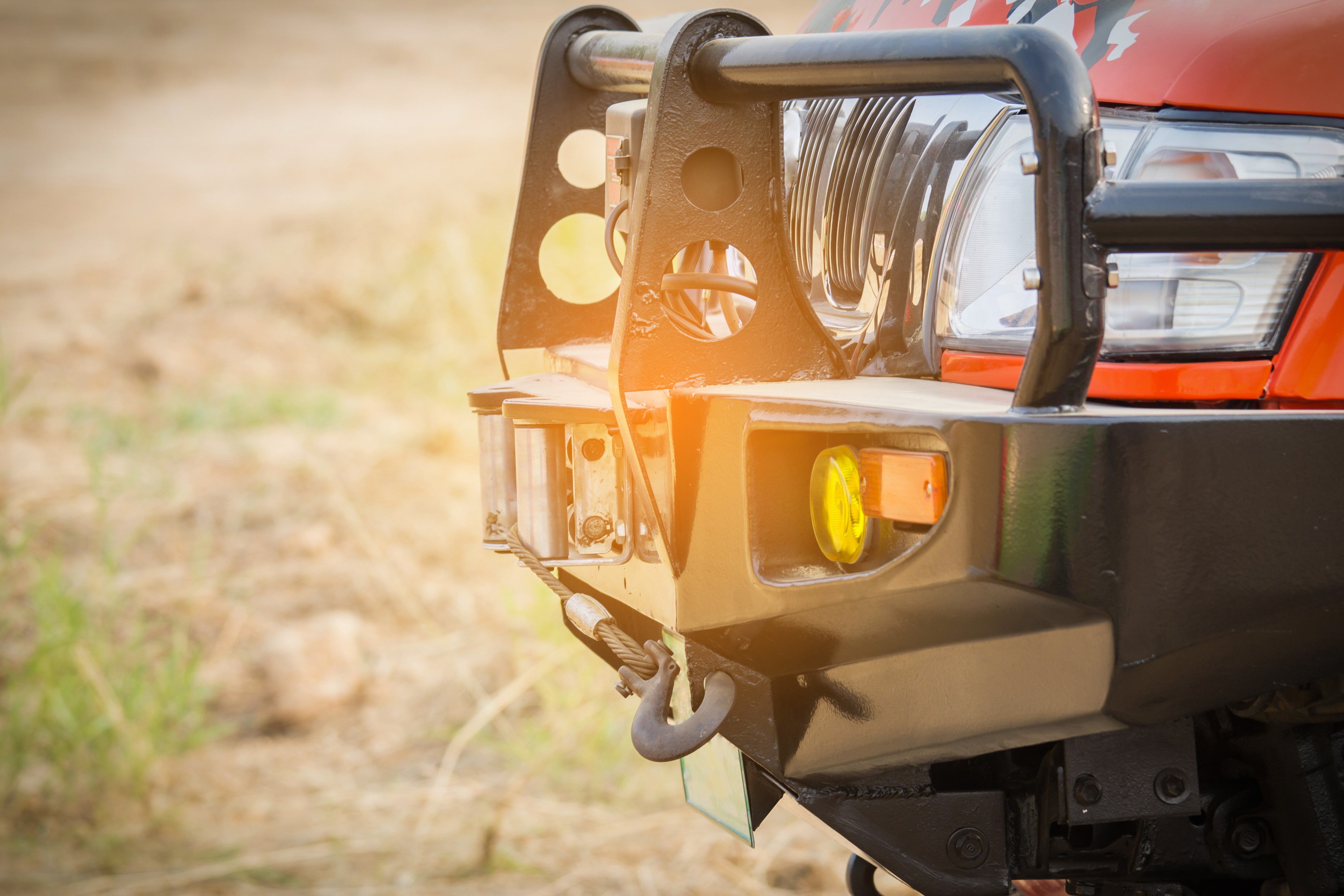 Truck front bumper with winch accessory
